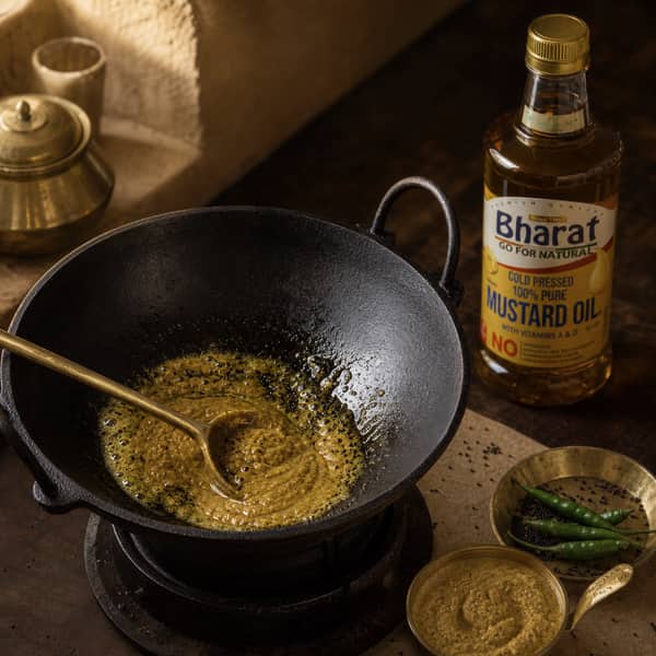 Mustard paste blooms in Bharat mustard oil inside a kadhai